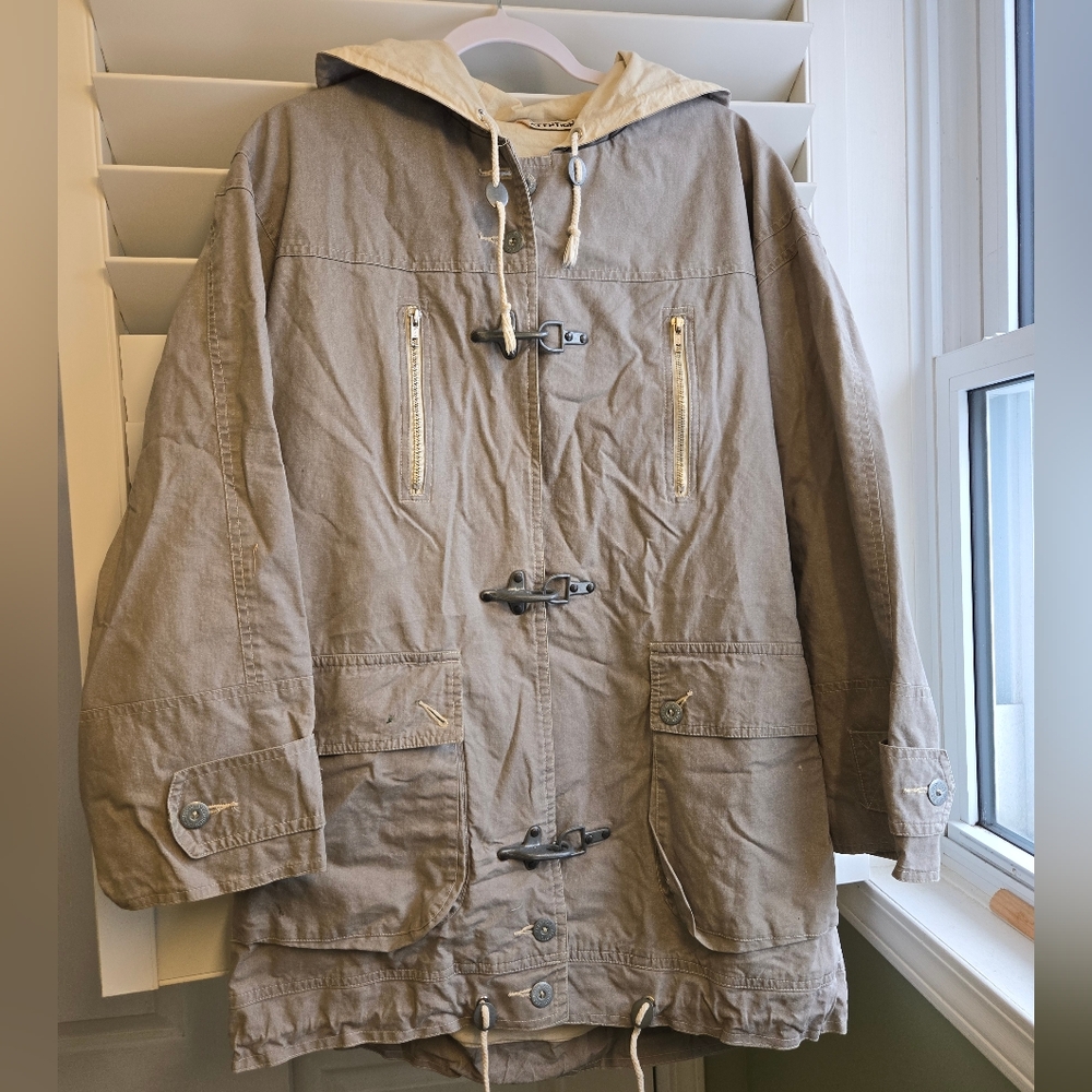 Vintage Hooded Tan Field Jacket with Utilitarian Style and Metal Clip Closure